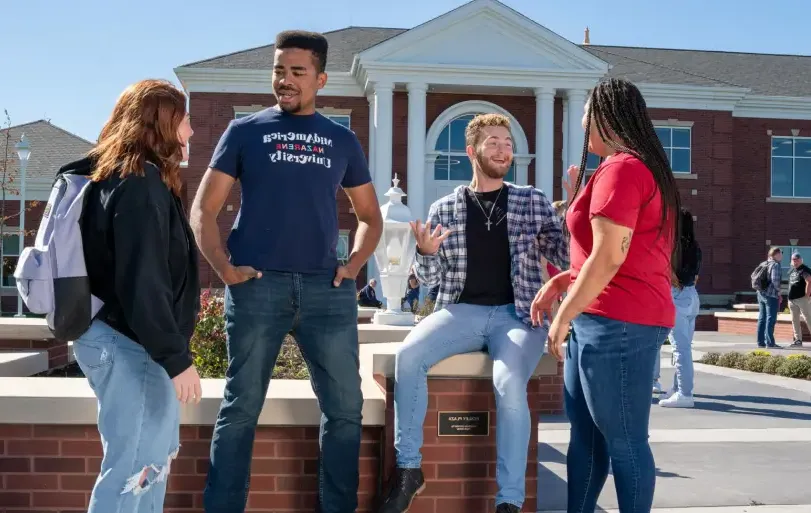 Students talking outside of Cunningham Center